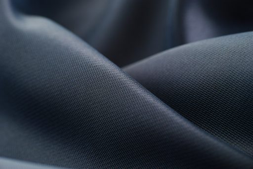 white textile in close up photography