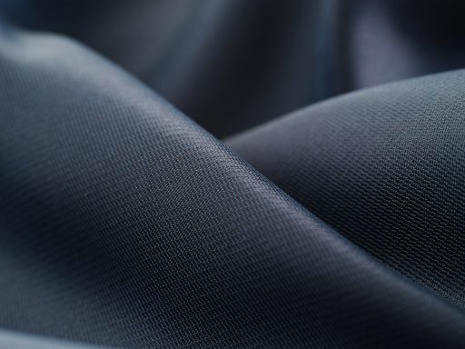white textile in close up photography