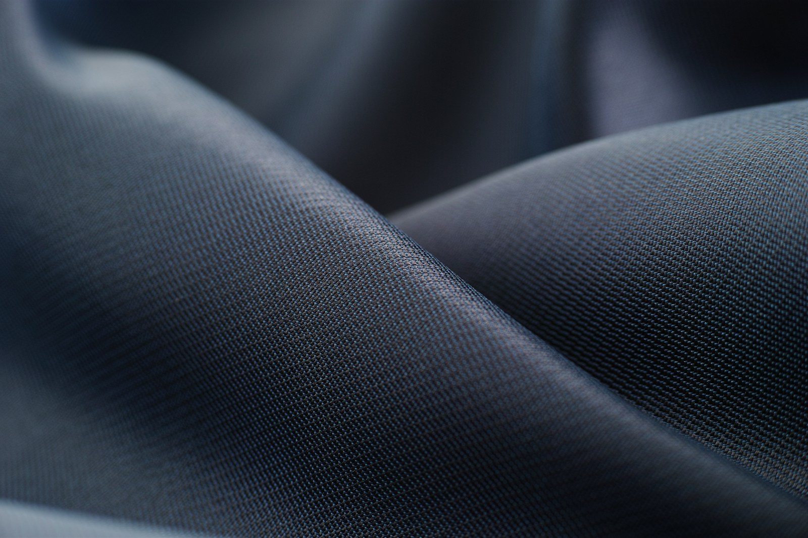 white textile in close up photography