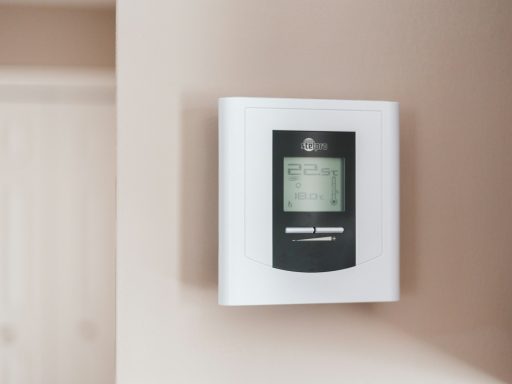 white and gray thermostat at 19 5