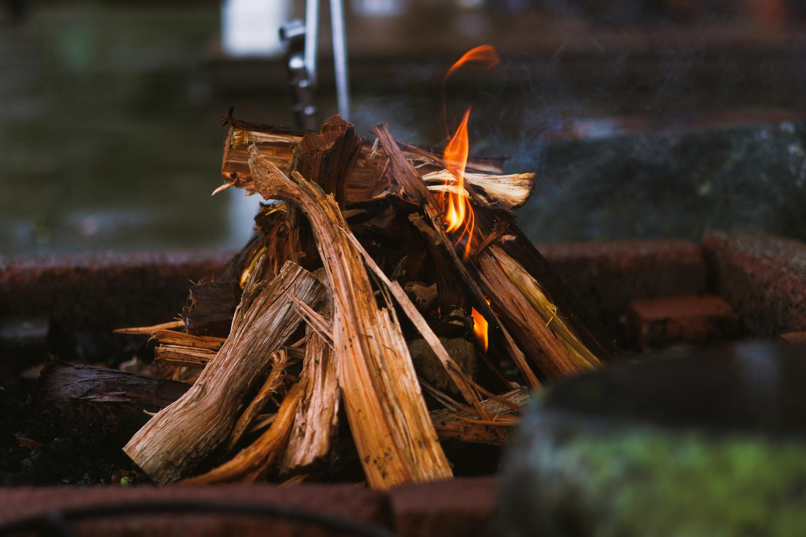 A warm glow from a crackling indoor wood fire, perfect for a cozy setting.