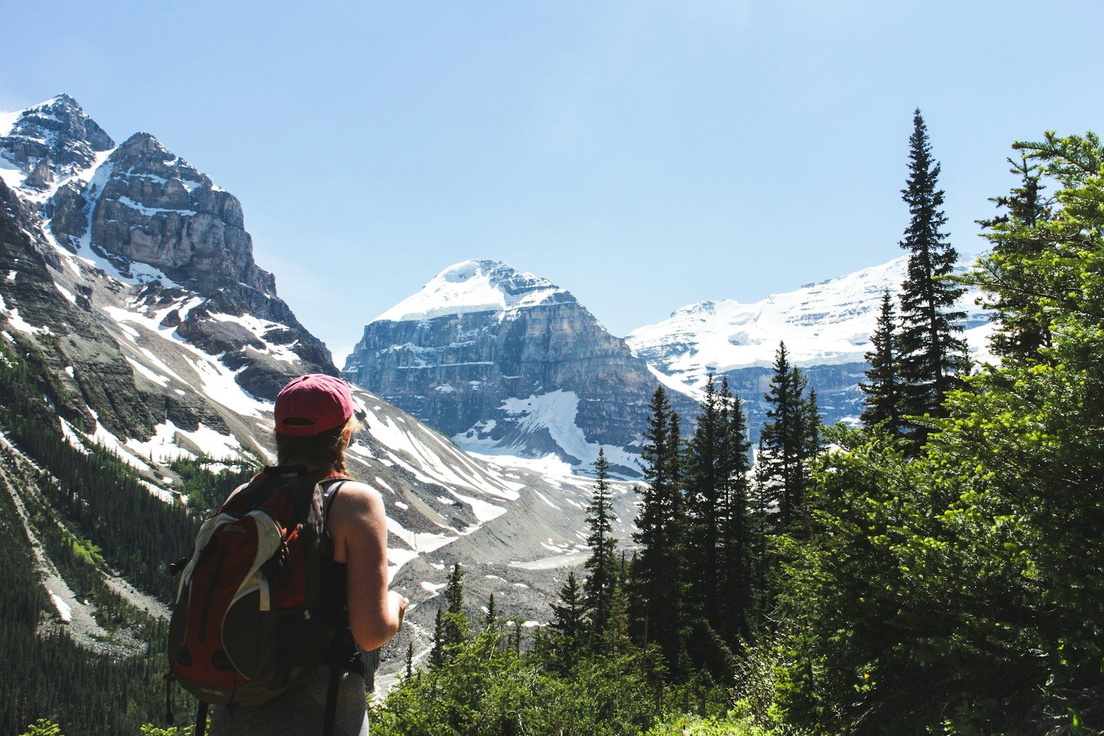man standing near mountains